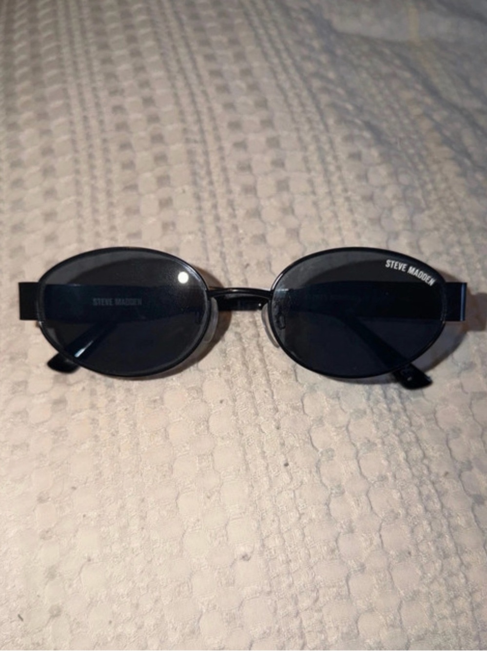 Steve Madden Black Oval Sunglasses with Dark Lenses